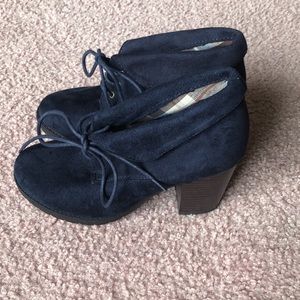 Francesca’s high heel laced ankle booties